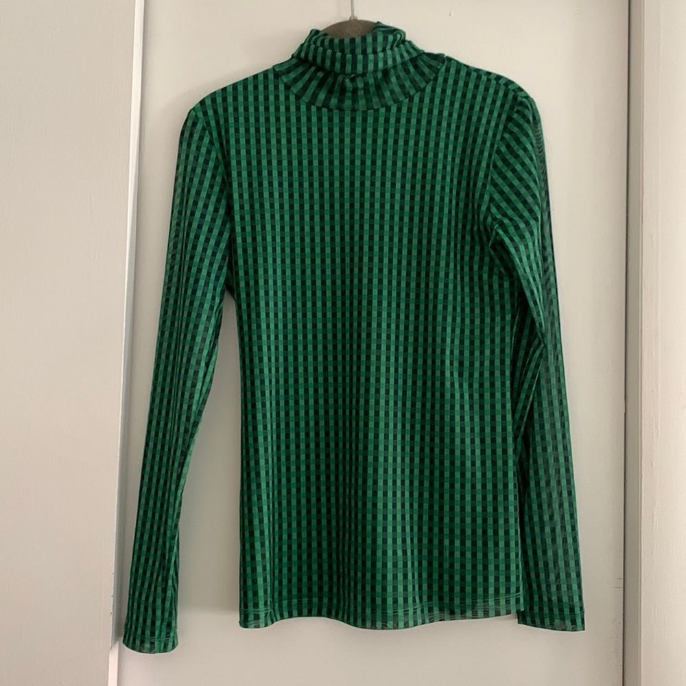 Mesh turtleneck top. Green and black plaid. Super cute. Super light.